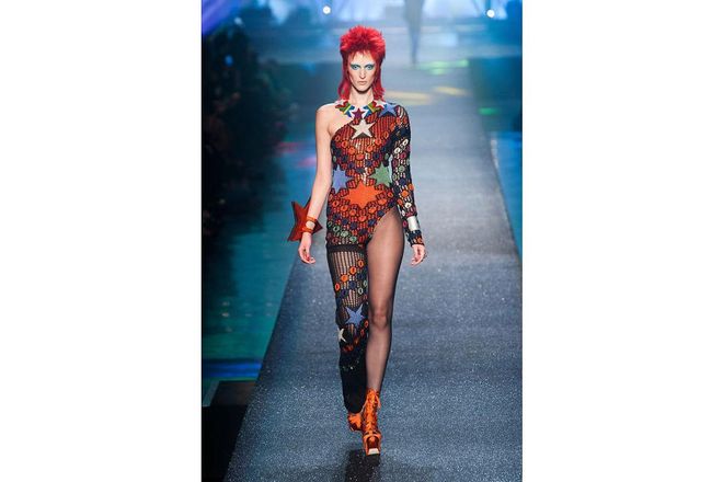 Jean Paul Gaultier's runway was a who's who of pop icons and smack dab in the middle was the spiky ginger Ziggy in a bold one-legged wonder.