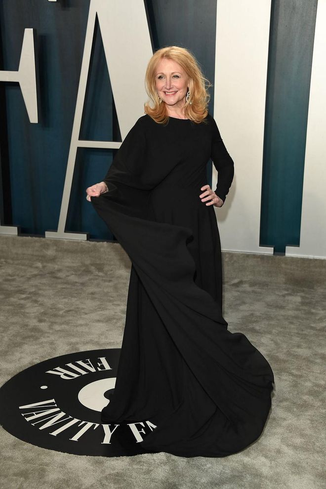In a floor-length black gown. Photo: Getty