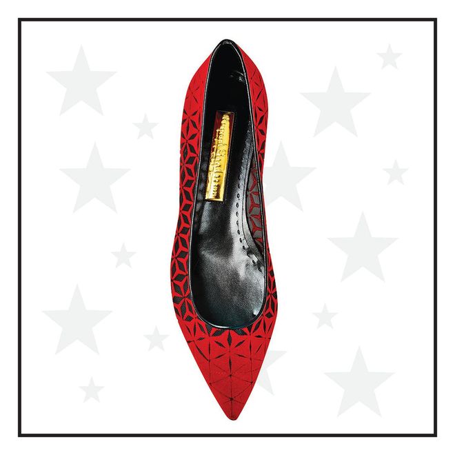 In a striking shade of red, these elegant point-toe pumps are daring and classic at the same time.