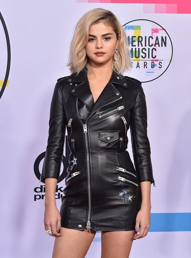 Platinum hair plus leather, the new Selena edgy and chic all rolled into one. Photo: Getty 