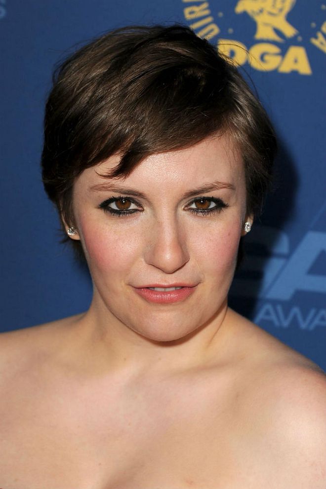 A little bit of layering and piece-y structuring in your bangs can help you achieve an cute mini flick like Dunham's.  Photo: Getty