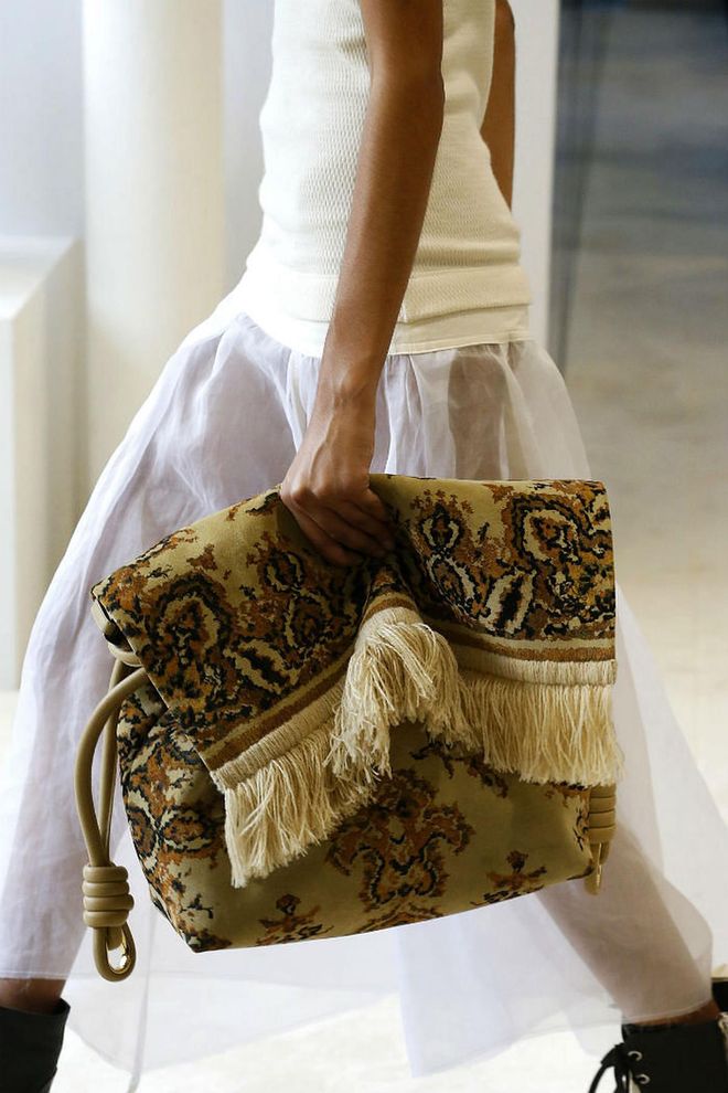 Seen at: Paris Fashion Week//Why we love it: When you turn carpets into chic bags, there is no reason why this design shouldn't be the talk of the town. (Photo: Getty)