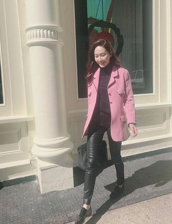 In a millenial pink coat and buttery soft jet black leather pants, it looks like Jung is tapping into her girl group roots. 
Photo: Instagram