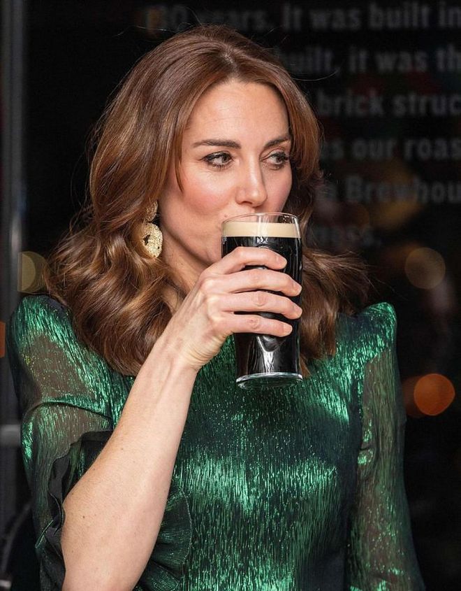 Kate sips on her beverage.

Photo: Getty