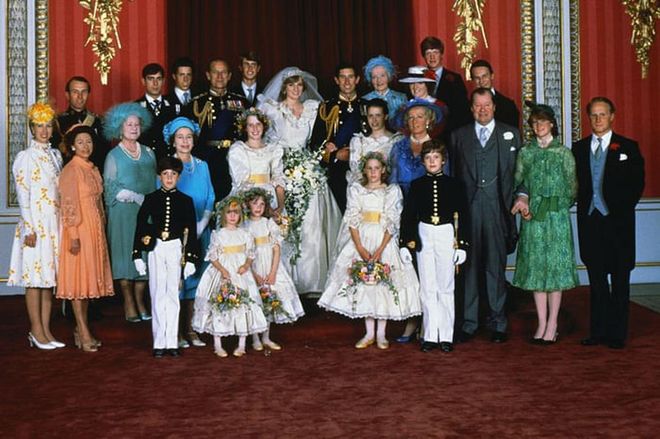 Charles and Diana wed on July 29, 1981 at St. Paul's Cathedral in London. After the ceremony, the newlyweds posed for photos with their family members, including the Queen, Prince Philip, Princess Margaret, Elizabeth the Queen Mother, Princess Anne, Prince Edward, Prince Andrew, Diana's mother Frances Shand Kydd, and her father John Spencer.