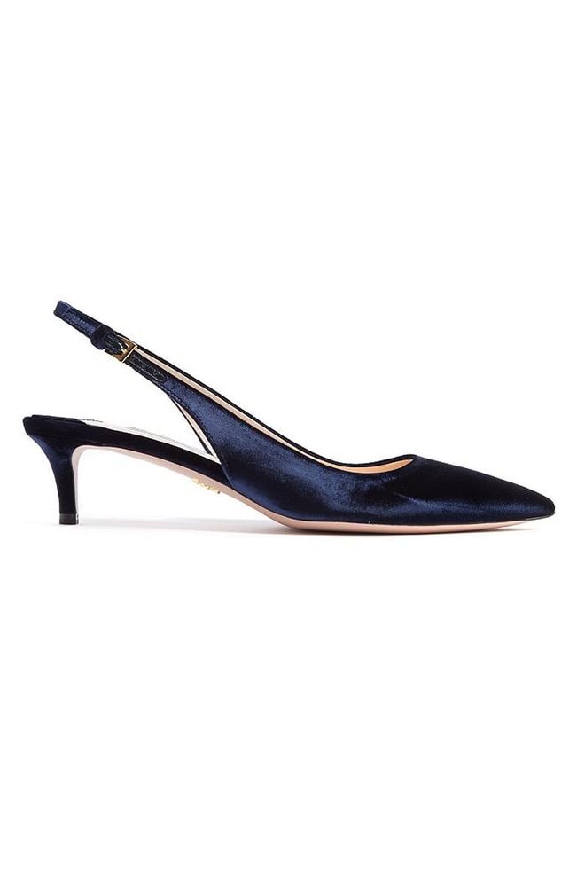 If you still haven't invested in a pair of kitten heels, now's the time to do so. Comfortable and chic, pair yours with denim, midi-skirts or culottes.
<b>Slingback velvet pumps, £420, Prada</b>