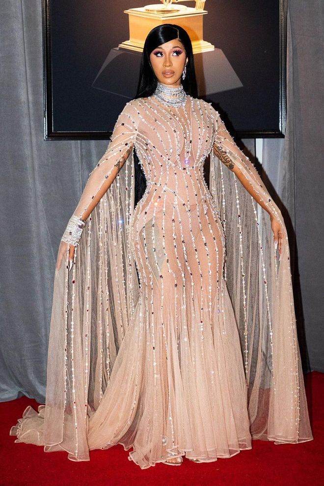 Continuing on from last year's custom Thierry Mugler triumph at the Grammys, Cardi B opted for the designer once again, choosing a bedazzled sheer dress for her appearance. Photo: Getty