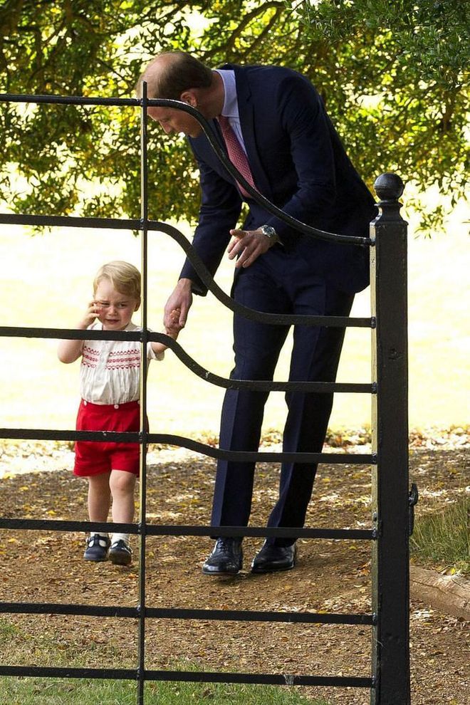 William consoles a crying Prince George after the christening of Princess Charlotte.

Photo: Getty