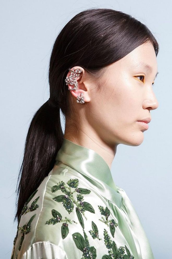 At Mulberry, a center-parted ponytail served as a the perfect canvas for the statement-making earrings. 