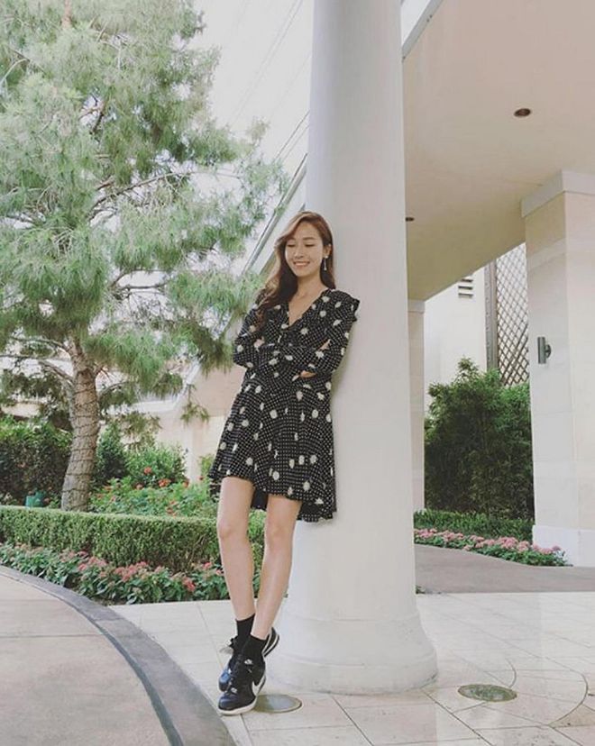 Long before she stashed her Nike Cortez sneakers in the back of her closet, Jung wears them with a dainty polkadot dress in Tokyo. 
Photo: Instagram