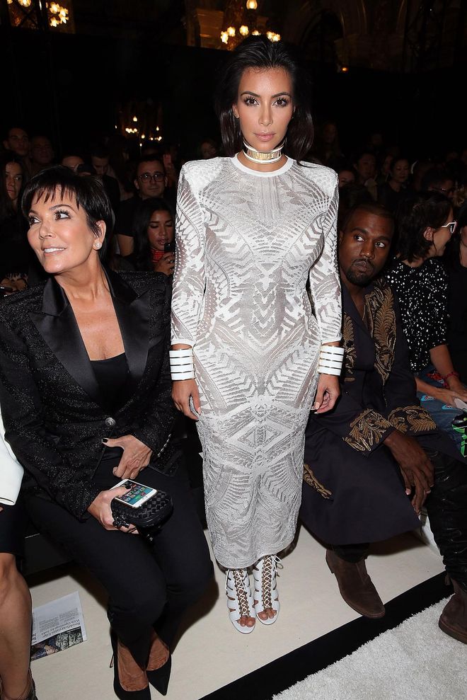 PARIS, FRANCE - SEPTEMBER 25:  Kris Jenner, Kim Kardashian and Kanye West Attend  the Balmain show as part of the Paris Fashion Week Womenswear Spring/Summer 2015 on September 25, 2014 in Paris, France.  (Photo by Michel Dufour/WireImage)