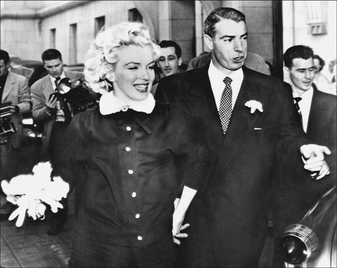 Monroe and Yankee star Joe DiMaggio pictured after marrying at city hall in San Francisco on January 14, 1954. Photo: Getty
