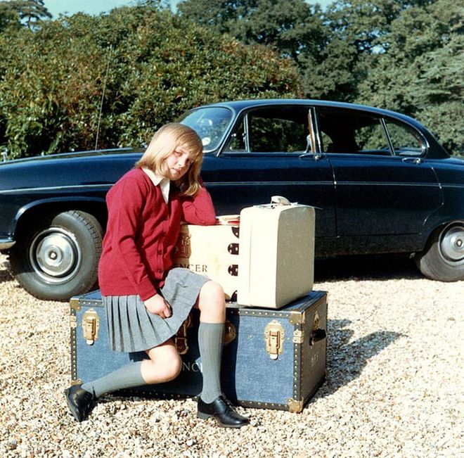 Diana sits on her suitcases as she prepares to go to boarding school at Riddlesworth Hall. Distraught over the separation from her home, she told her father, “If you love me, you won’t leave me here.”

