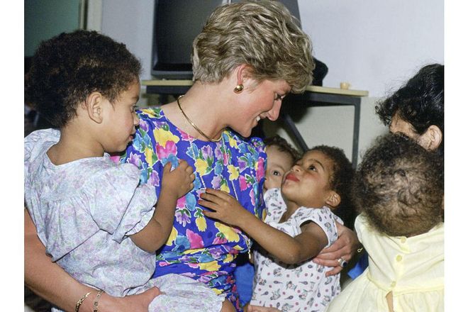 When Diana spoke with children, she always crouched to see them at eye-level. (It's become a signature move of her daughter-in-law.) "Diana was the first member of the royal family to do this," said Ingrid Seward, editor of Majesty magazine. "The royal family used to say that everyone had to be deferential to them. But Diana said, 'If someone might be nervous of you or you're speaking to a very young child or a sick person, get yourself on their level.'"