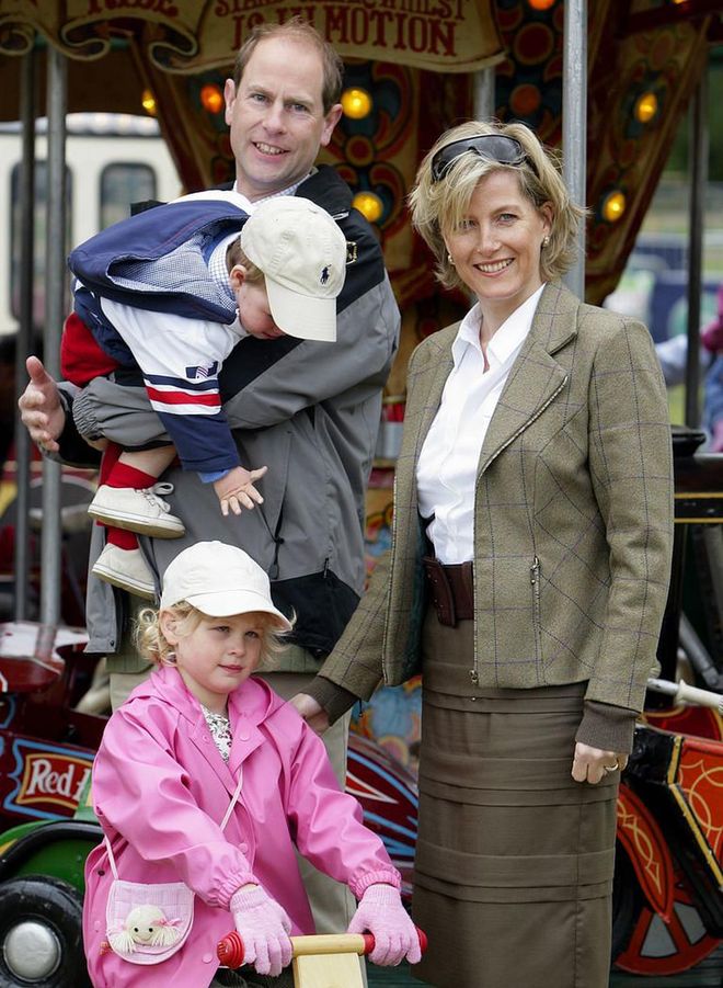 James, Viscount Severn, reaches for his older sister, Lady Louise Windsor, at the Royal Windsor Horse Show in 2009. Prince Edward and his wife, Sophie, Countess of Wessex, married in 1999. They welcomed Lady Louise in 2003, and James joined the family in 2007. Louise and James are the youngest of Queen Elizabeth and Prince Philip's eight grandchildren.
Photo: Getty 
