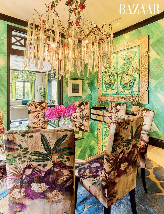 The formal dining area with the painting Balinese Dancers by Nyoman Gunarsa, and a Serip chandelier. Photo: Lawrence Teo