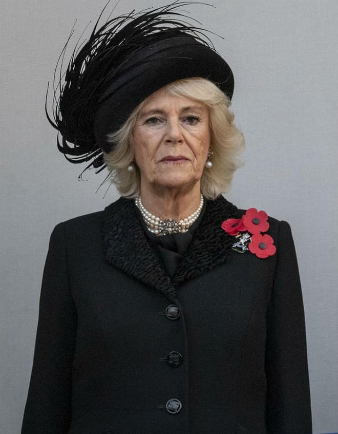 Prince Charles's wife pays her respects.

Photo: Getty