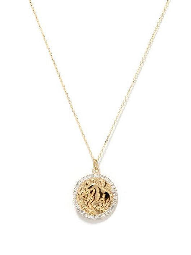 Taurus large diamond & 14kt gold zodiac necklace (Photo: Mateo)