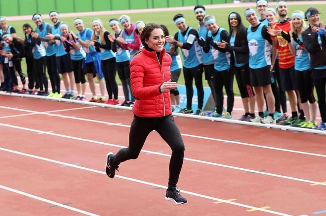 The Duchess trades in her usual formal style for sneakers and workout clothes for a relay race at London Marathon Training Day at the Queen Elizabeth Olympic Park.
Photo: Getty