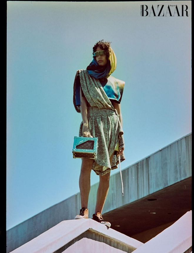 Top; skirt with sash; hood; sunglasses; bag; sneakers, Louis Vuitton.

Photo: Alvin Kean Wong