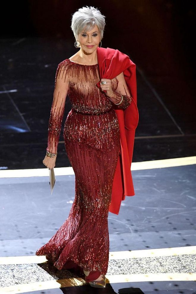 This was the second outing for Jane Fonda's embellished red Elie Saab dress. The actress was first seen in the design during the Cannes Film Festival in 2014 and she chose to bring it back for her big moment last night, where she revealed the winner for the prestigious Best Picture award.

Photo: Kevin Winters / Getty