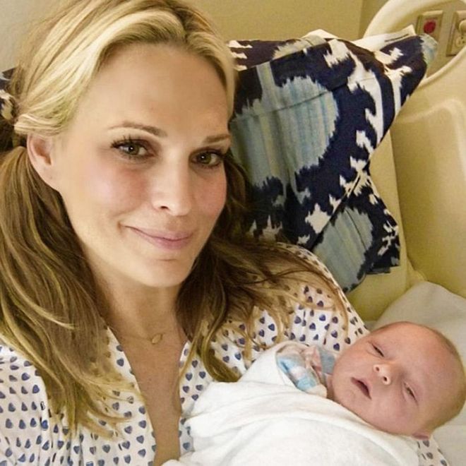 Molly Sims revealed on Instagram that she has named her latest addition Grey Douglas Stuber. This is the third child for the former Victoria's Secret model and her film-producer husband Scott Stuber. They already have four-year-old Brooks and an almost two-year-old daughter called Scarlett.