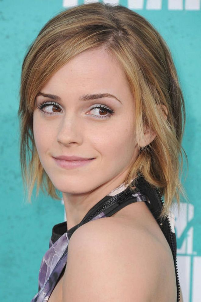 Back to blonde, Watson shows off her choppy lob at the MTV Movie Awards. 