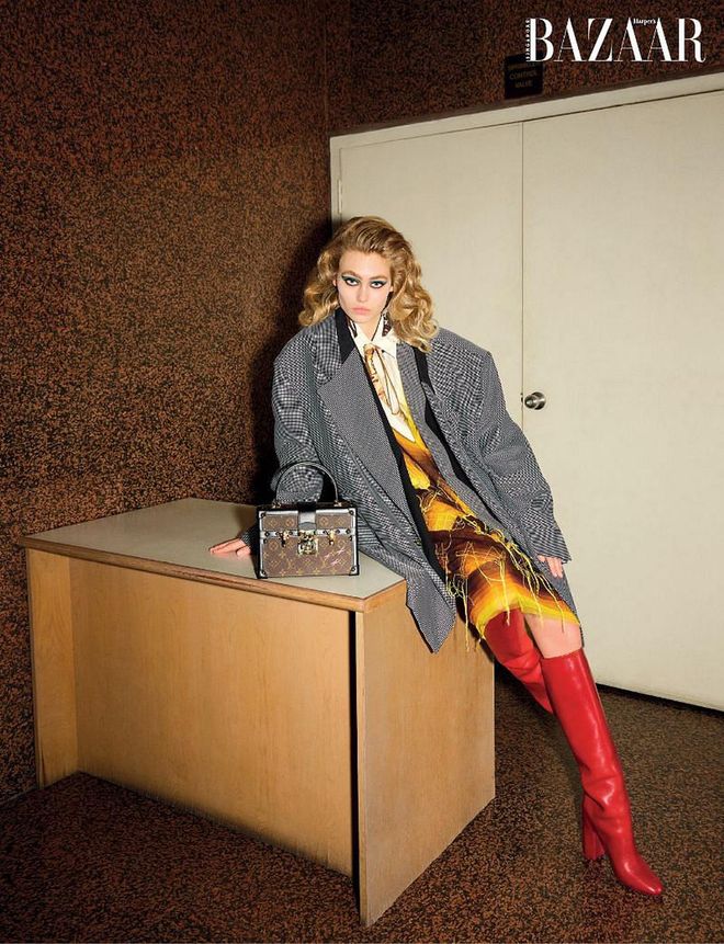 Coat; dress; shirt; tie; boots; Petite Malle V bag, Louis Vuitton.

Photo: Stefan Khoo