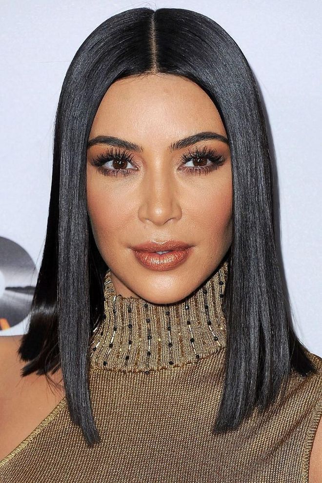 Kim Kardashian traded in her Cher hair for a Cleopatra-inspired cut, style, and length.

Photo: Getty