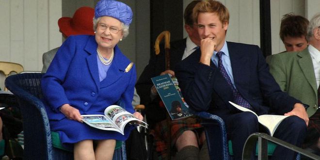 Queen Elizabeth and Prince William sit together at the Braemar Royal Highland Gathering. Photo: Getty