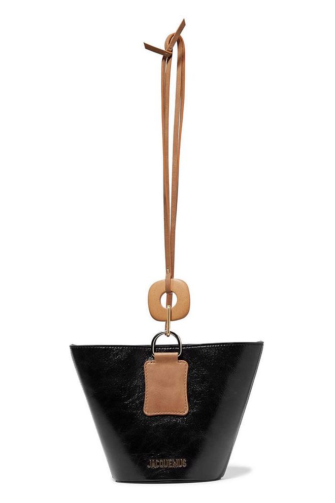 Mid-range bucket bags are killing it lately and this one by Parisian brand, Jacquemus has its own unique je ne sais quoi