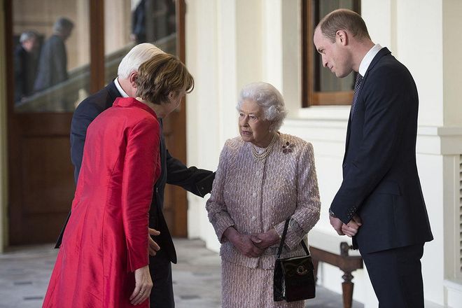 You may notice that the Queen is never without a handbag, and that’s because she uses it to send signals. For example, when she wants to leave dinner, simply setting her bag on top of the table lets her aides know that the party is ending shortly and that she wants to leave.

Also, when she’s in conversation and switches her purse to her other hand, it means that she would like to politely wrap it up. "It would be very worrying if you were talking to the Queen and saw the handbag move from one hand to the other," royal historian Hugo Vickers told People.
Photo: Getty