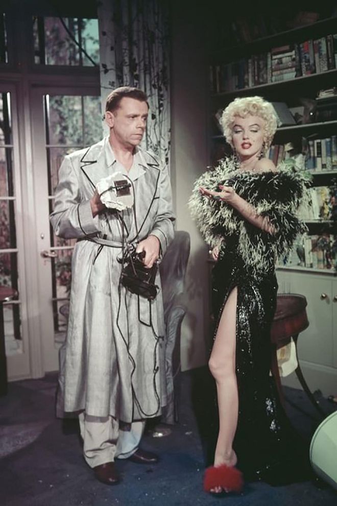 Though that infamous white halter dress may be Marilyn Monroe's most-known look from The Seven Year Itch, the rest of her costumes from the movie are not to be overlooked. Monroe's character has a collection of perfect white summer dresses (including a black-and-white polka-dot number that transcends its time) along with this chic fur stole and red fur slippers that surely paved the way for 2017's ubiquitous fur slides.

Photo: Getty
