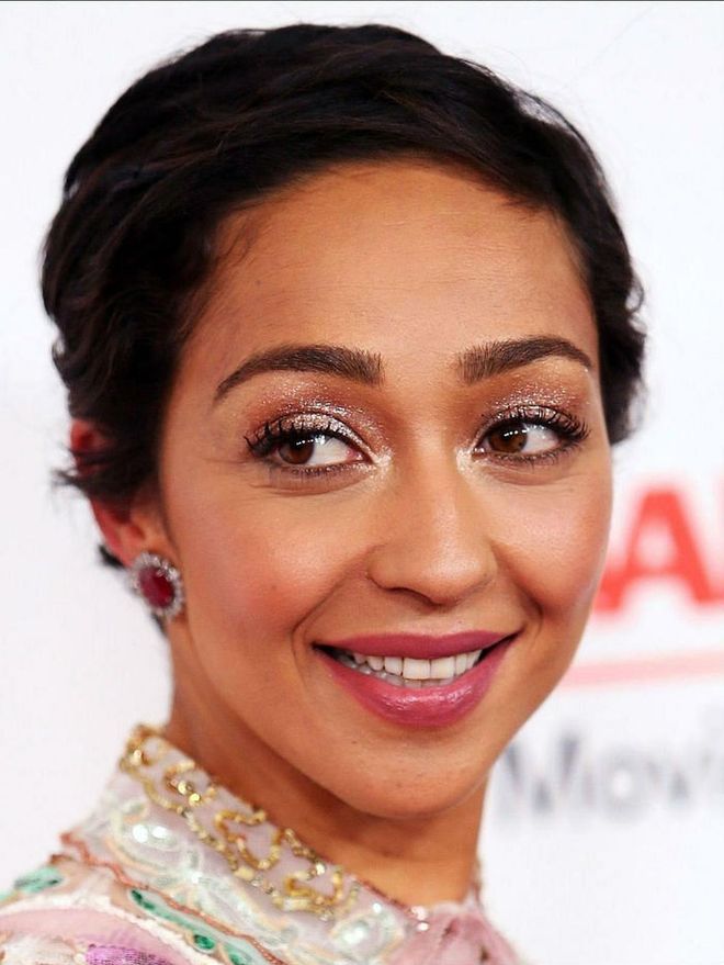 If you think you can't wear glittery eye makeup as a sophisticated adult, just look to Ruth Negga. The actress wore arguably the prettiest all-pink beauty look this year, with oversized metallic glitter flecks included.