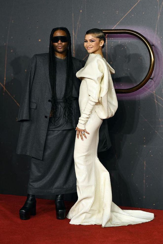 Zendaya poses in a Rick Owens gown at a screening of Dune last fall with her stylist, Law Roach. (Photo: Jeff Spicer/Getty Images)