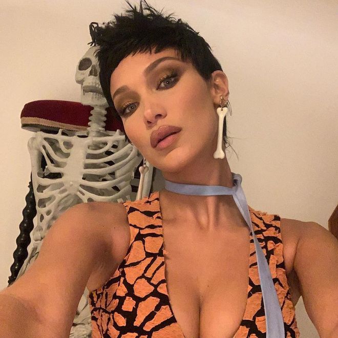 Who knew Fred Flintstone costumes could be so chic? Thank you to Bella Hadid and her bone-shaped earrings for this Halloween revelation.