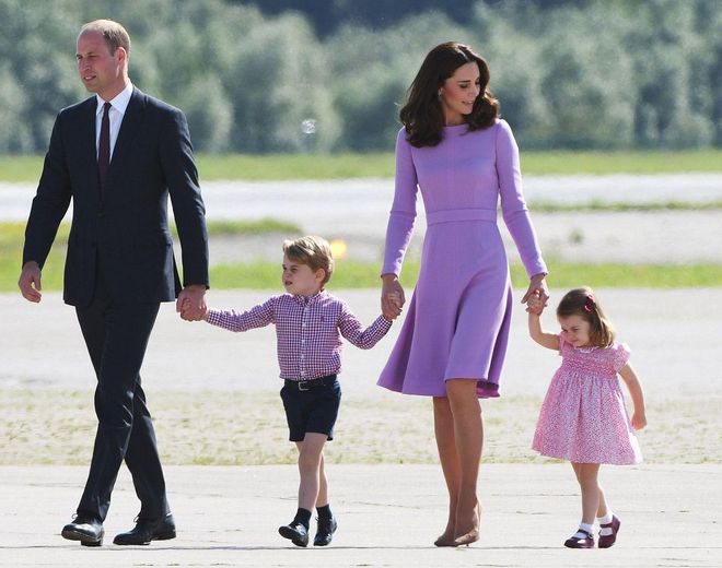 Holding hands on the tarmac of the Airbus compound in Hamburg, during the final leg of their royal tour of Germany. Photo: Getty 