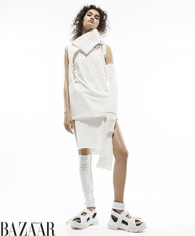 Rick Owens tunic, tank top, skirt, sleeves (worn on arm and leg), and sandals