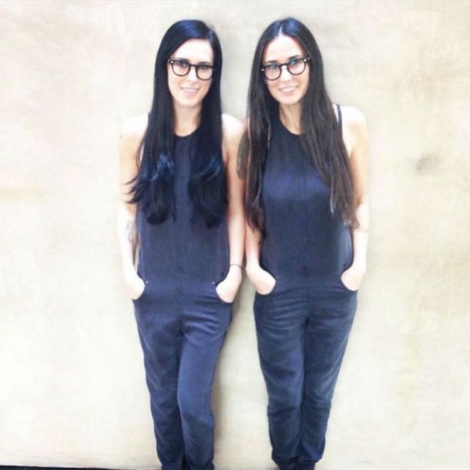 Looking like actual twins, Demi Moore and her daughter Rumer Willis posed for a side-by-side photo a couple years back in matching black jumpsuits and round eyeglasses. The mother-daughter duo's matching long black hair took their uncanny resemblance to the next level. Photo: Instagram