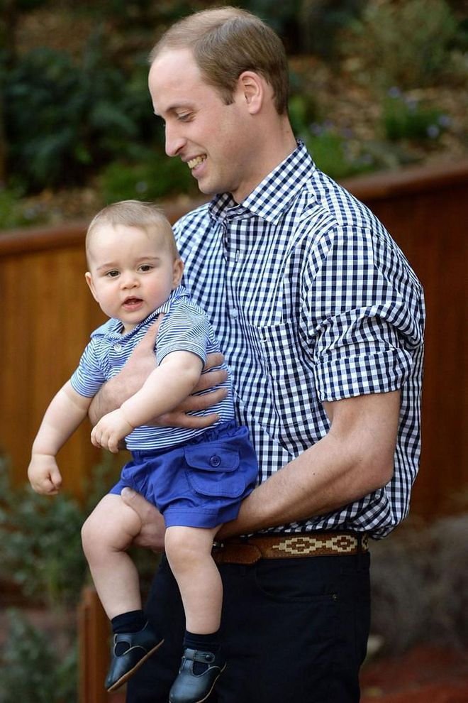 And again, William smiles on as he carries Prince George at the zoo.

Photo: Getty
