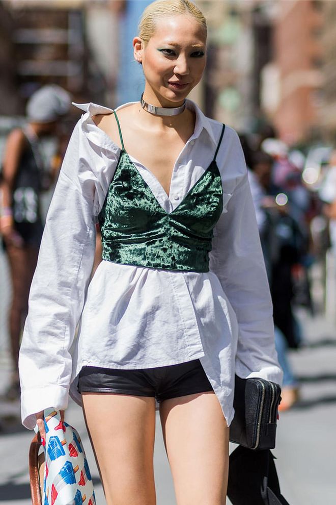 For a casual look, Soo Joo Park wears her velvet bralet over a oversized collar shirt and leather shorts. Photo: Getty