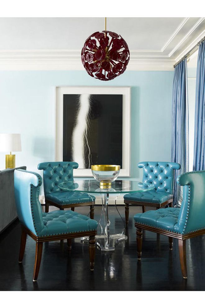 Looking to take your first big risk with color? Traditionally summery shades – like this aqua – feels sophisticated when grounded with dark wood floors and brass accents. Similar to shown: Gentle Aquamarine by Sherwin-Williams. Photo: Eric Piasecki/Dering Hall



