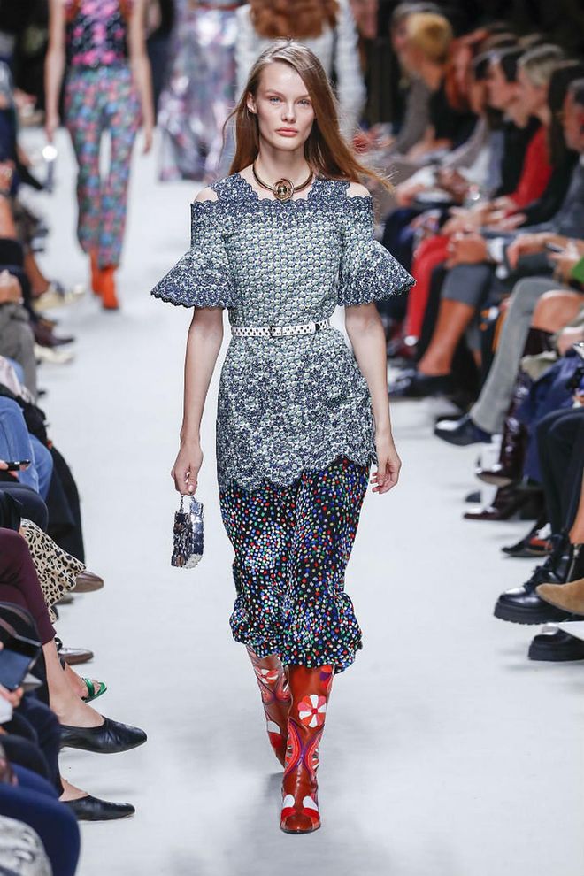 This tricky trend is back in season, and you'll want to embrace the quirk of clashing prints. Paco Rabanne nails this print-on-print look.

Photo: Showbit