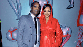 Rihanna Wraps Up In A Red-Hot Leather Coat Dress For Valentine's Date With A$AP Rocky
