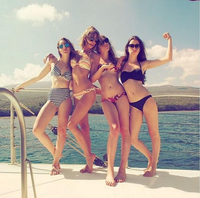 This pic put to rest the conspiracy theory that Taylor Swift doesn't have a belly button (almost exclusively wearing high-waist bottoms tends to do that), though the debate surrounding the bent railing rages on.  Photo: Instagram